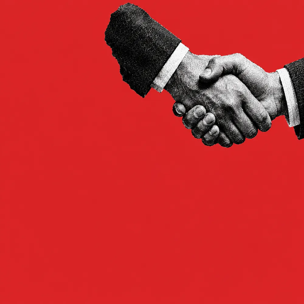Black-and-white handshake on a red background